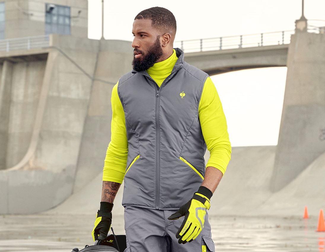 Topics: Bodywarmer e.s.trail + basaltgrey/acid yellow