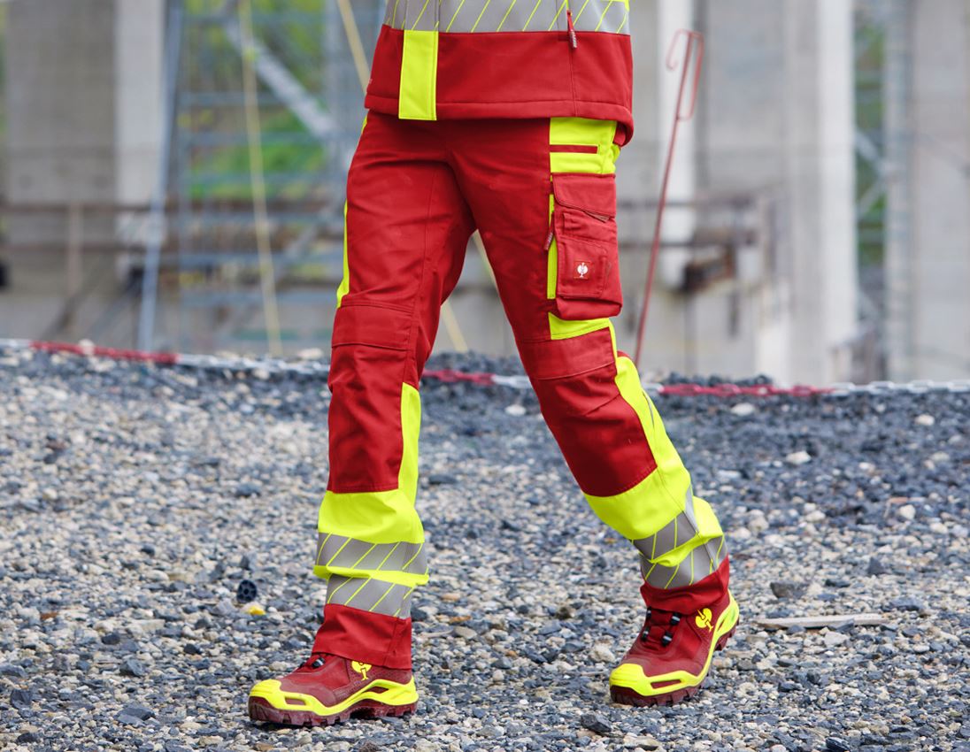 Work Trousers: High-vis trousers e.s.motion 24/7 + red/high-vis yellow