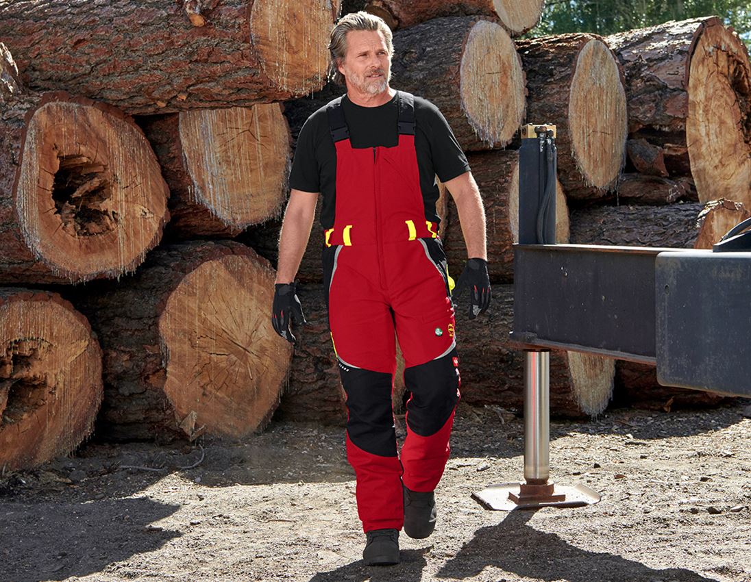 Sikkerhedstøj skovbrug / motorsav: e.s. skovoverall med skærebeskyttelse, KWF + rød/advarselsgul